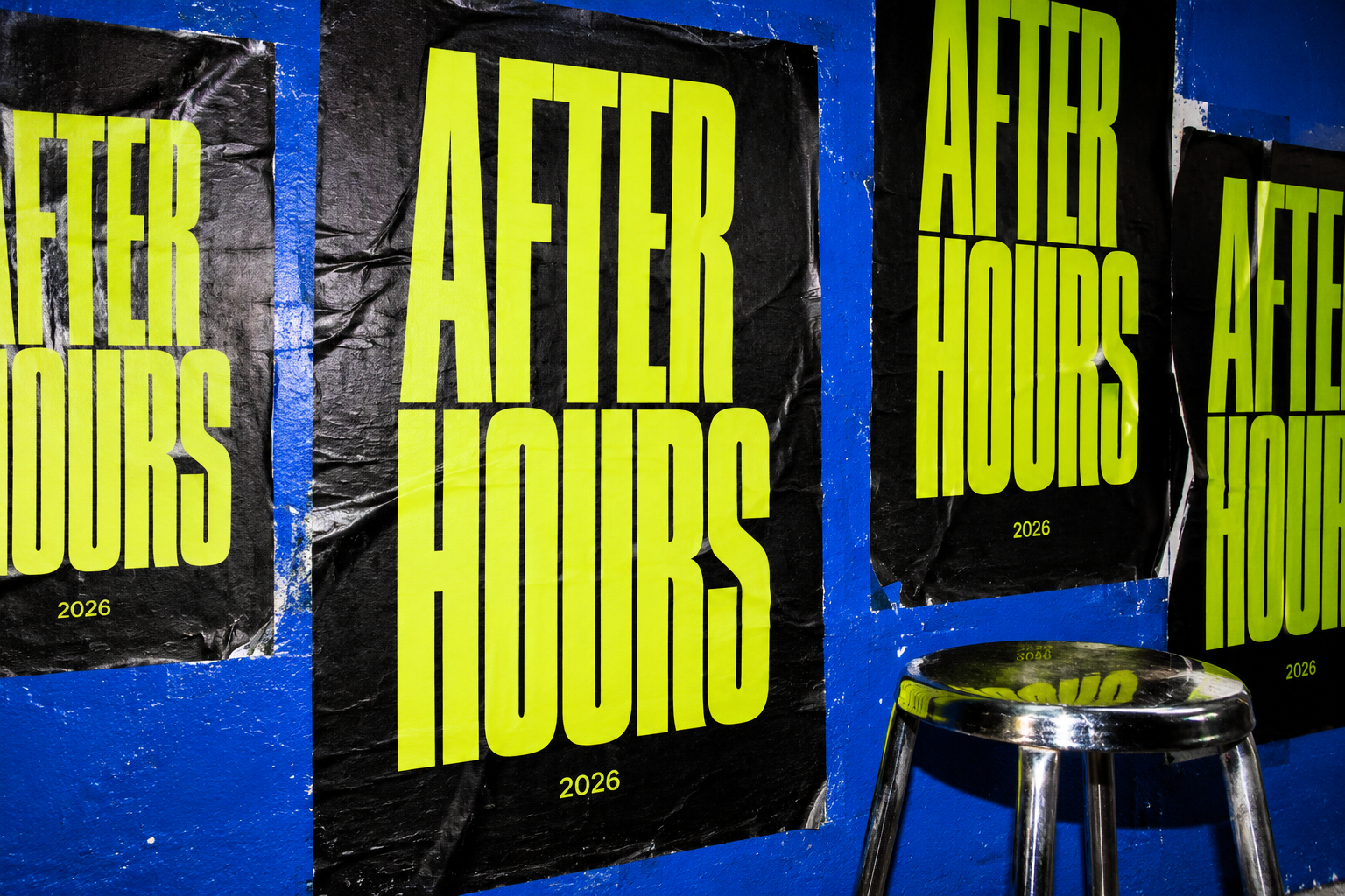 After Hours festival posters on a cobalt wall